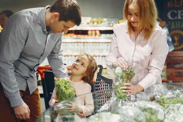 stock photo portrait of man worker loading plastic boxes of peaches at fruit warehouse 1552773440